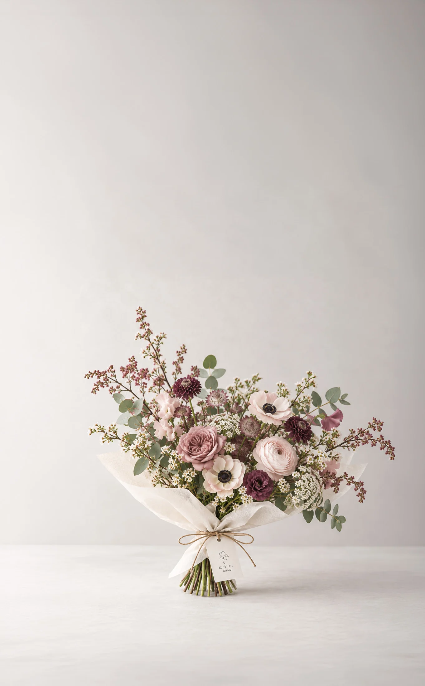 Dusky pink flowers gathered in a loose bouquet